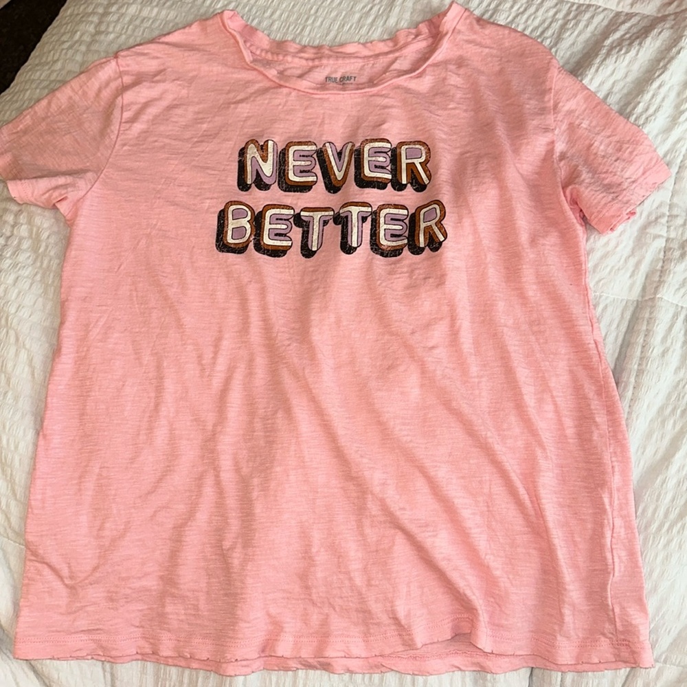 Junior’s Light Pink Graphic Tee